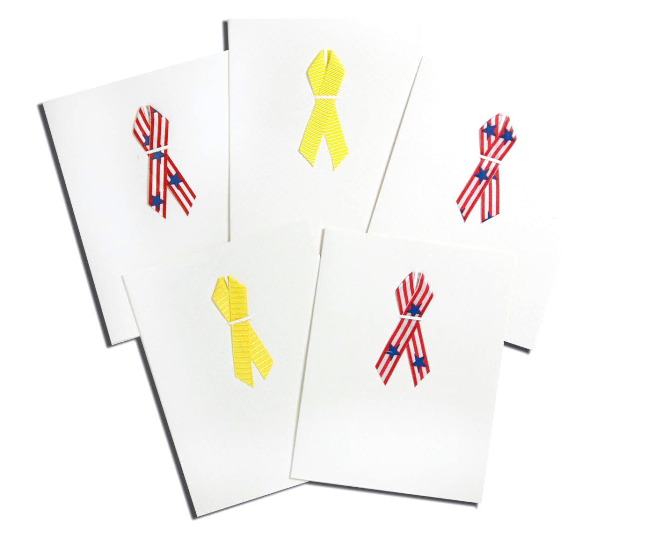 A set of five cards with ribbons on them.