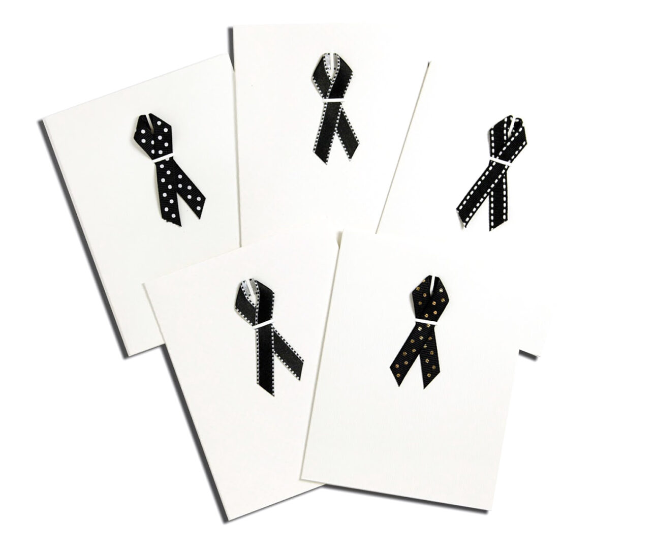 A set of five cards with black and white ribbon designs.